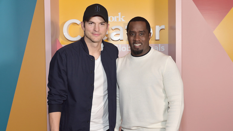 Ashton Kutcher and Diddy posing together