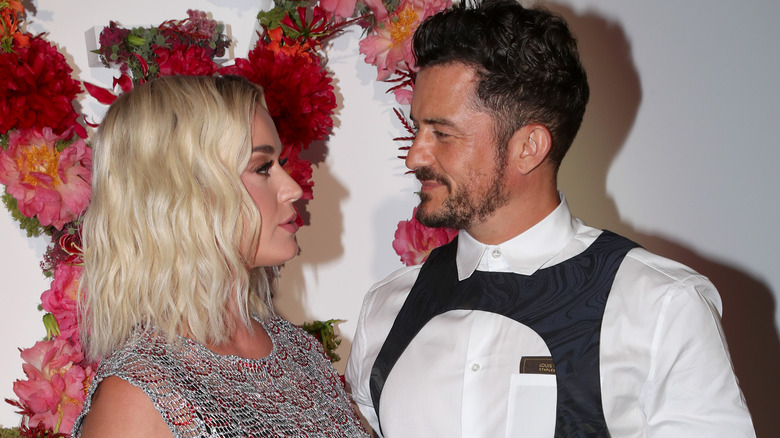 Katy Perry and Orlando Bloom look at each other