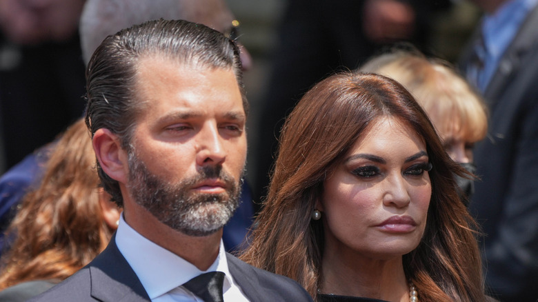 Donald Trump Jr. and Kimberly Guilfoyle serious