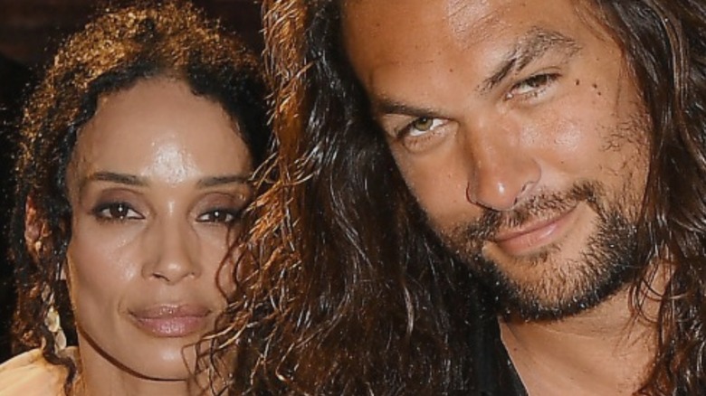 Jason Momoa and Lisa Bonet seated together