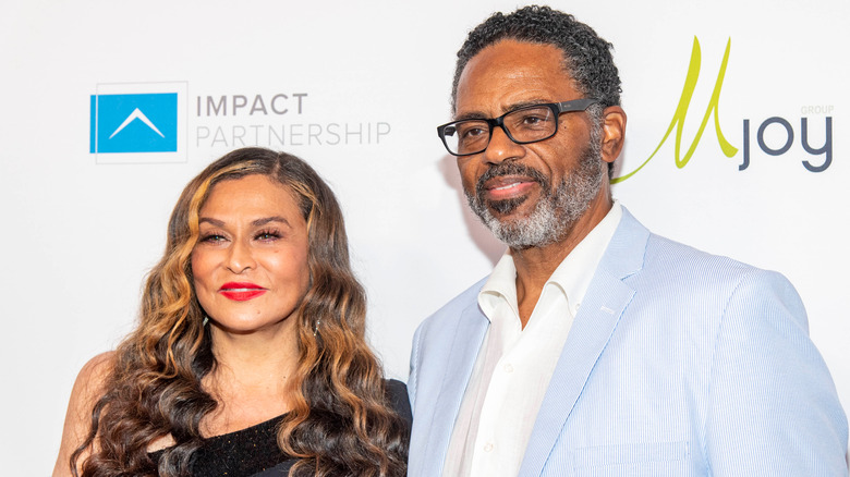 Tina Knowles and Richard Lawson pose together