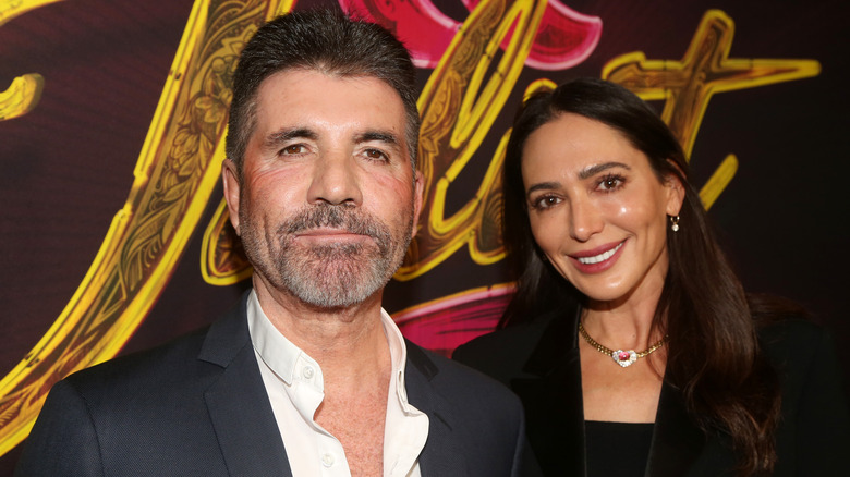 Simon Cowell and Lauren Silverman dressed up