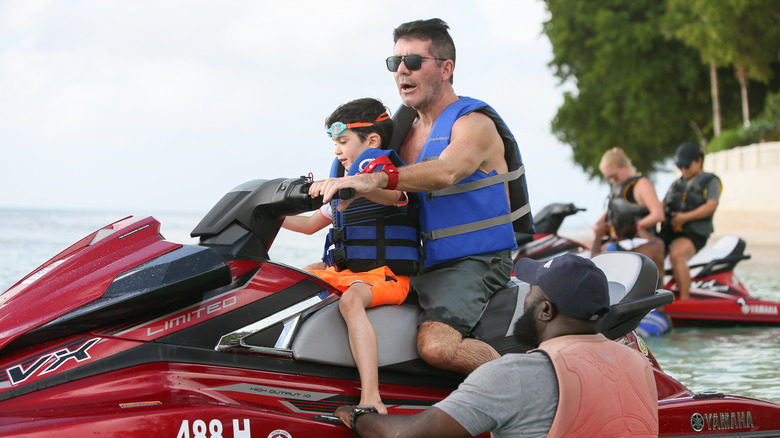 Eric, Simon Cowell on watercraft