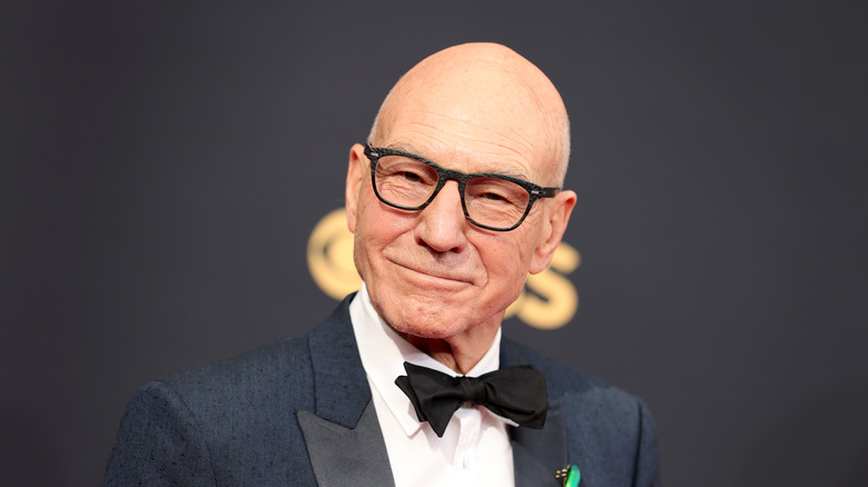 Patrick Stewart posing in a tux
