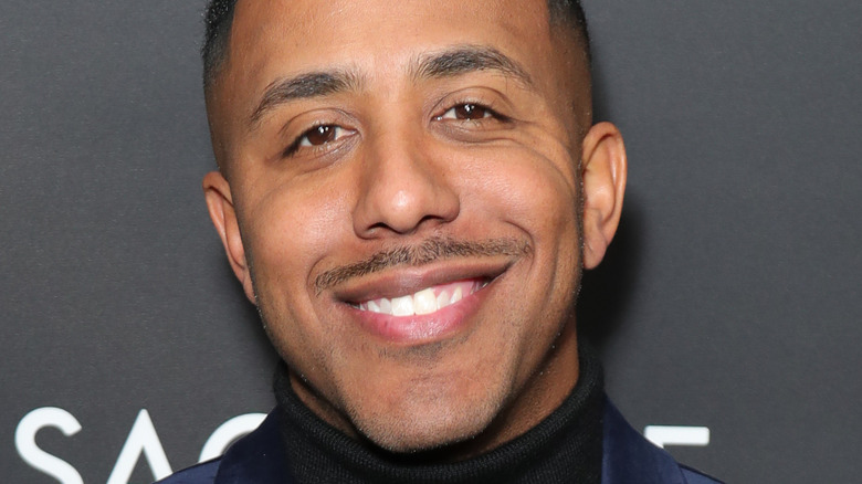 Marques Houston smiles red carpet 