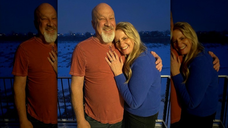 Christine Brown posing with David Woolley