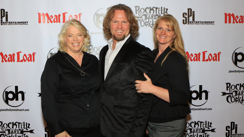 Janelle Brown, Kody Brown, and Christine Brown from "Sister Wives" posing in 2013.