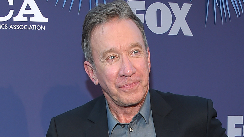 Tim Allen looking away from camera