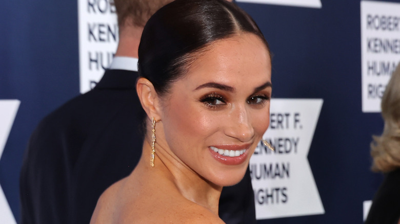 Meghan Markle with gold earrings