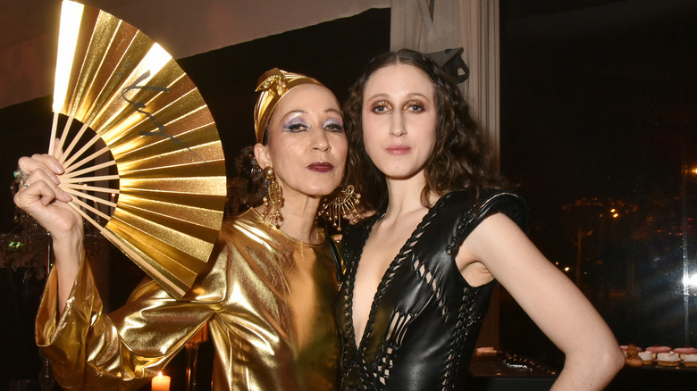 Anna and Pat Cleveland posing at an event