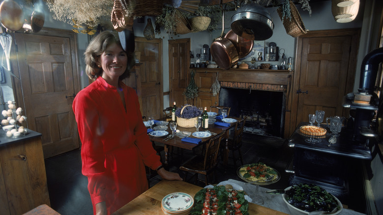 A young Martha Stewart in the 1970s posing in her kitchen