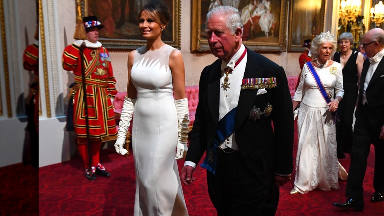 Melania Trump walking with Prince Charles.