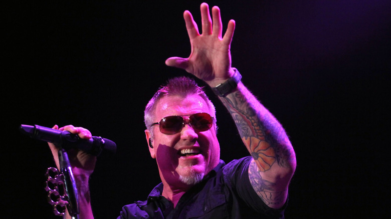 Steve Harwell smiling on stage