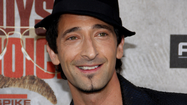 Adrien Brody hat and soul patch