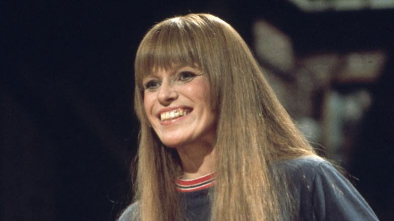 Louise Lasser smiles on Saturday Night Live stage