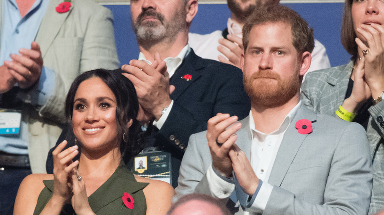 Meghan Markle and Prince Harry clapping