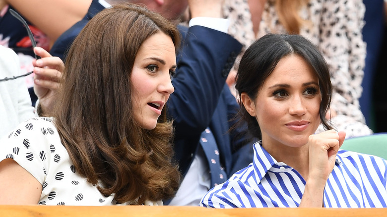 Kate Middleton and Meghan Markle chatting