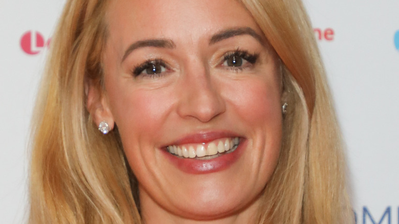 Cat Deeley smiling on the red carpet