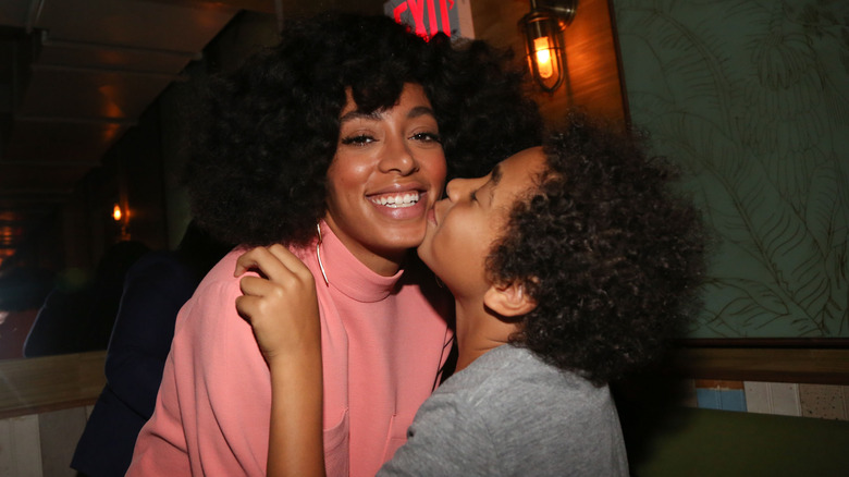 Julez Smith kissing Solange Knowles