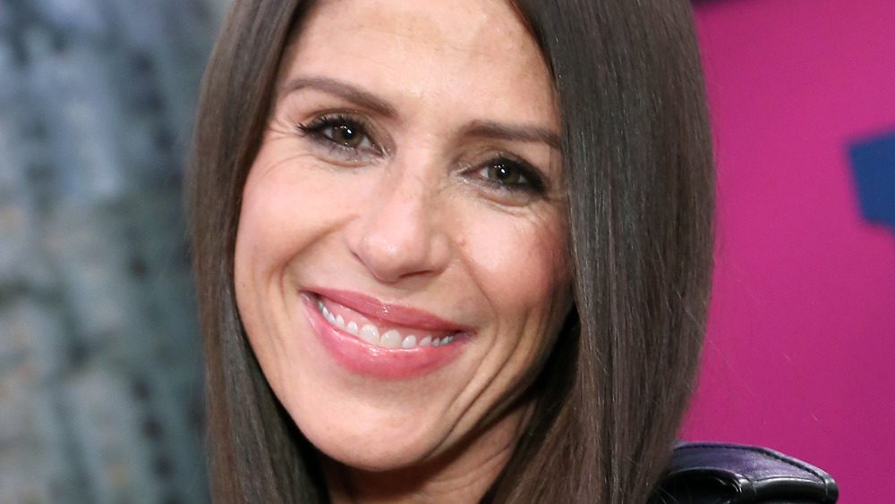 Soleil Moon Frye smiling at an event