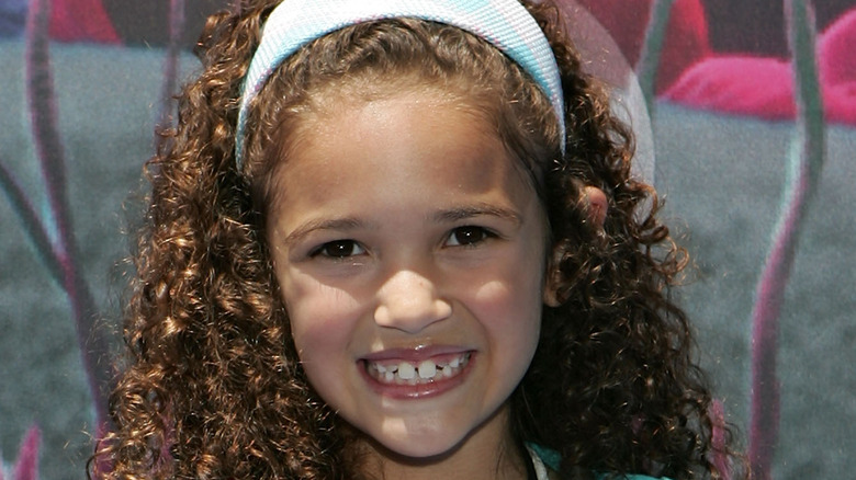 Madison Pettis wearing headband