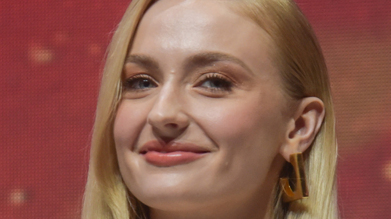 Sophie Turner smirking