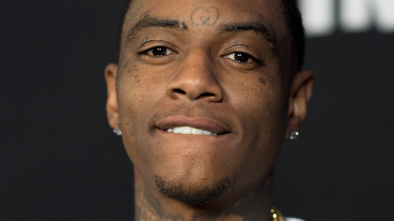 Soulja Boy biting his lip