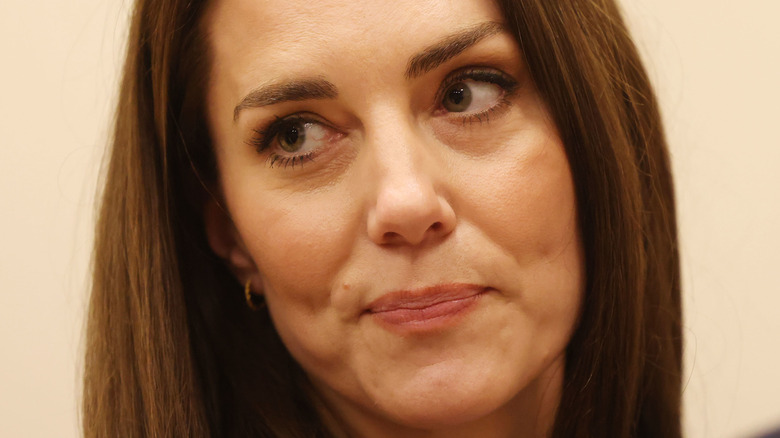 Kate Middleton pursing her lips