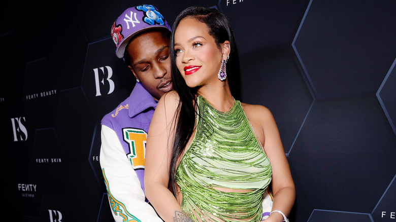 Rihanna and A$AP Rocky posing