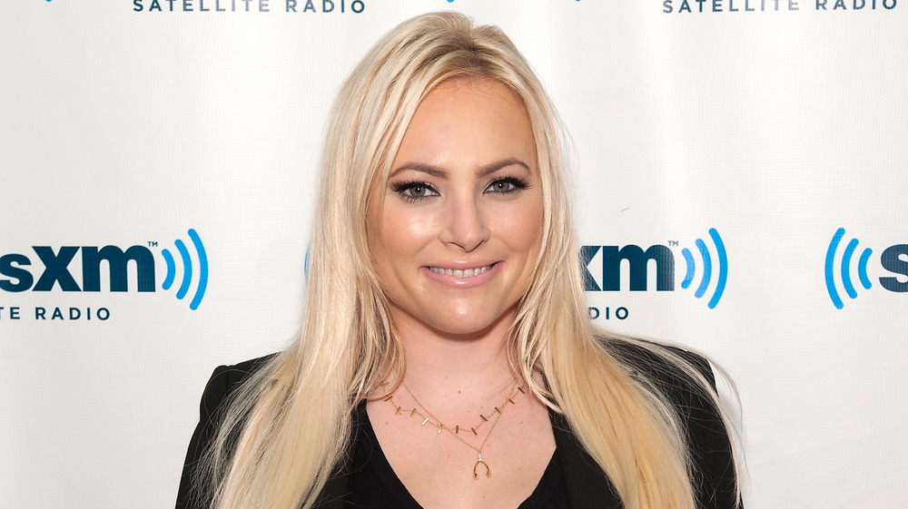 Meghan McCain smiling and posing