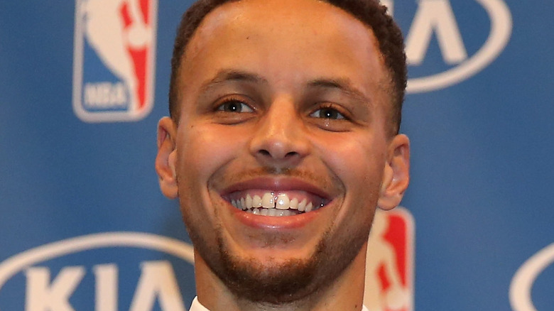 Stephen Curry with his most valuable player awards