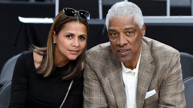 Dorys Madden smiling with Julius Erving