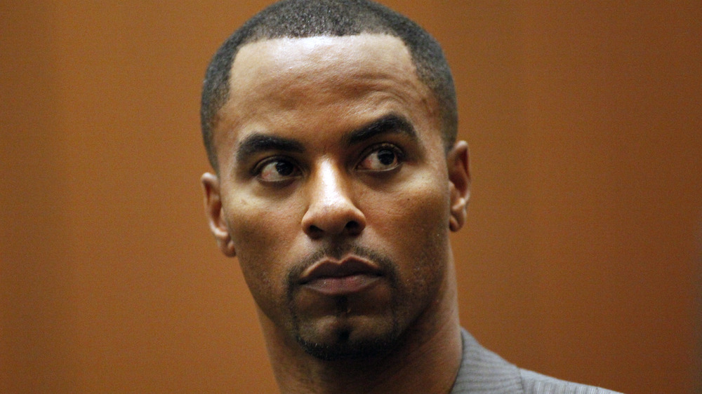Darren Sharper wearing gray jacket