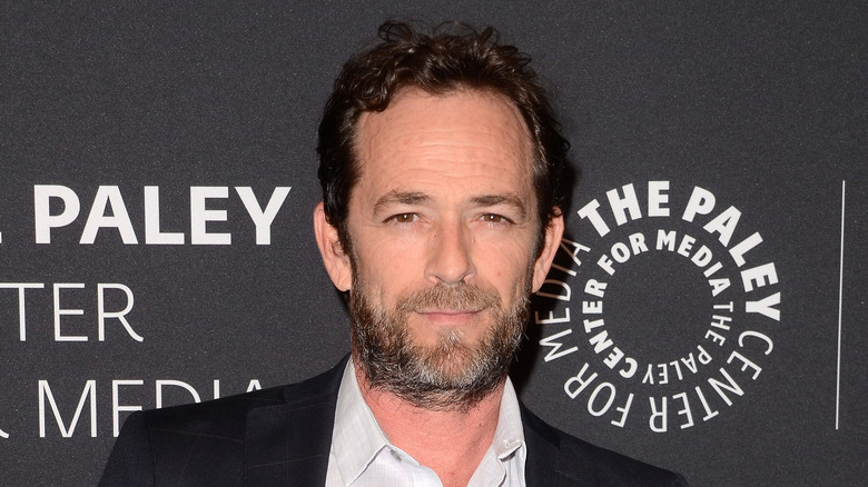 Luke Perry black suit