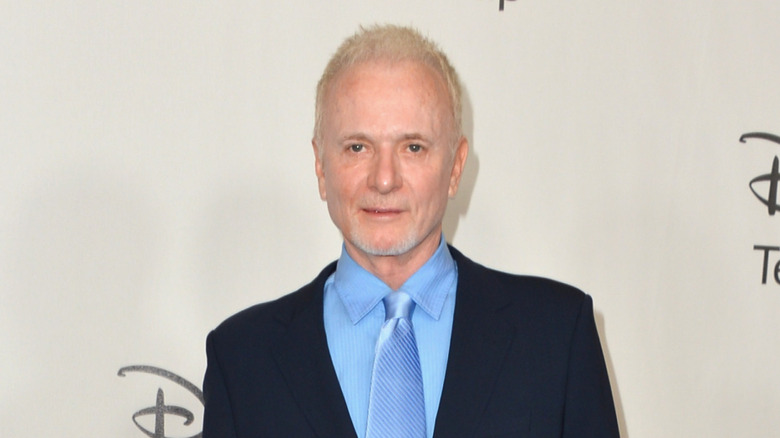 Anthony Geary posing in front of a white background