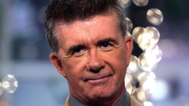 Alan Thicke smiling on set