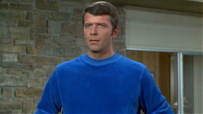 Robert Reed in blue sweater