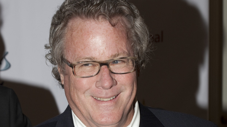 John Heard smiling