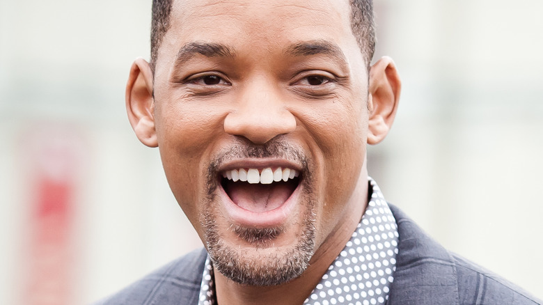 Will Smith smiles