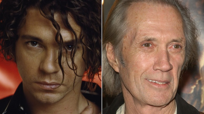 Michael Hutchence staring, David Carradine smiling