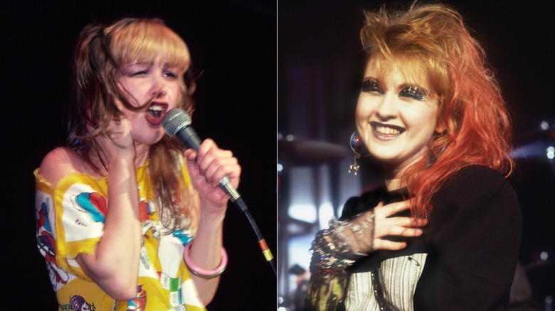 Cyndi Lauper on stage with multi-colored hair; Cyndi Lauper on stage with red hair