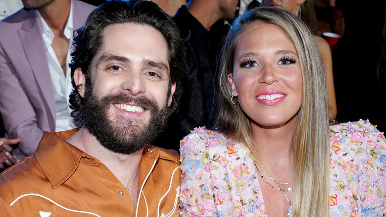 Thomas Rhett smiling with Lauren Akins