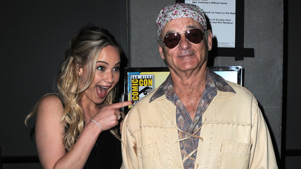 Jennifer Lawrence pointing and smiling at Bill Murray