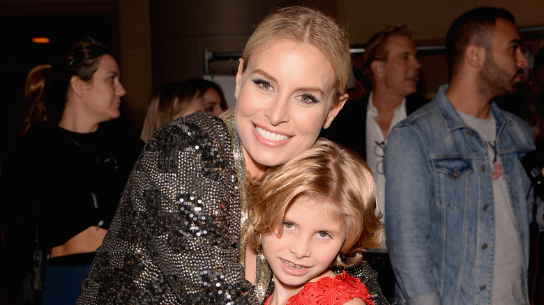 Niki Taylor posing with daughter Ciel