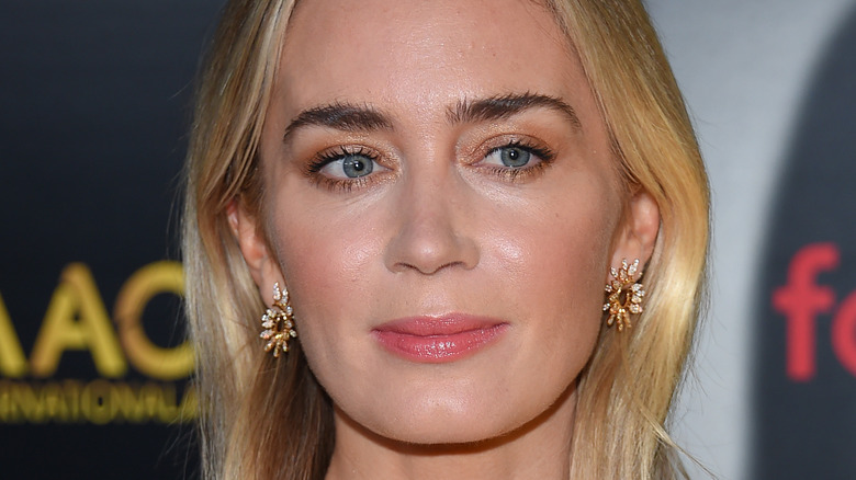 Emily Blunt, faint smile