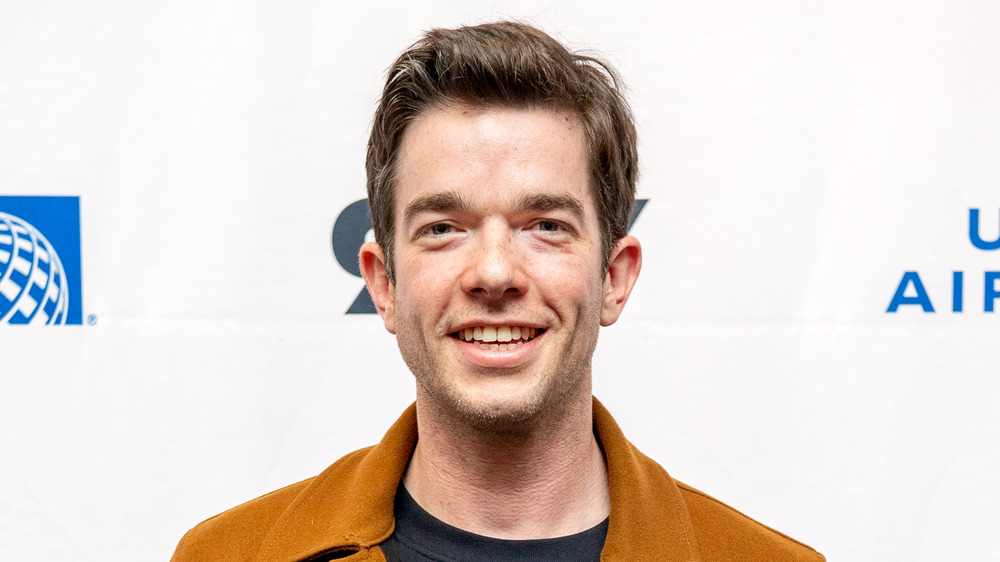 John Mulaney smiling