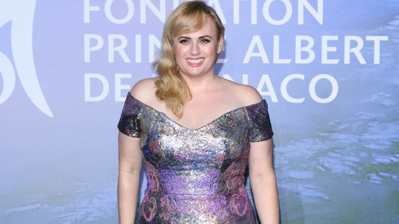 Rebel Wilson smiling at event