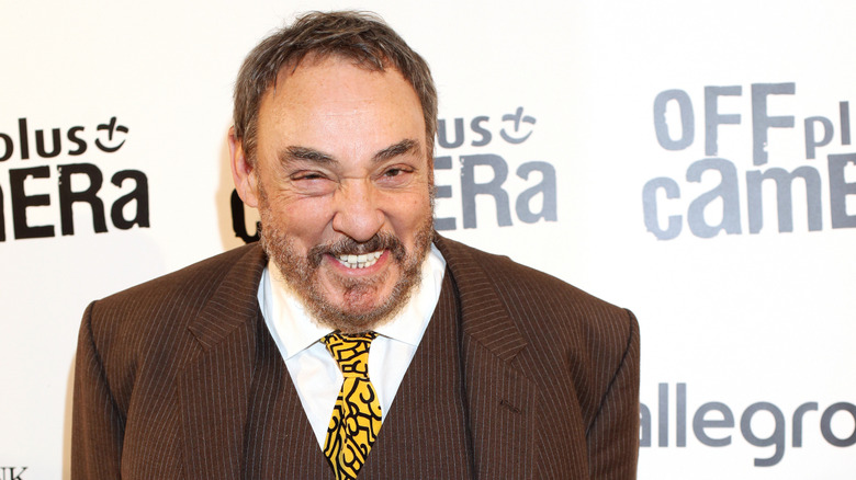 John Rhys-Davies smiling