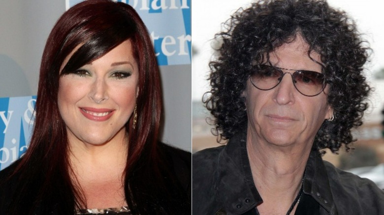 Carnie Wilson smiling, Howard Stern posing