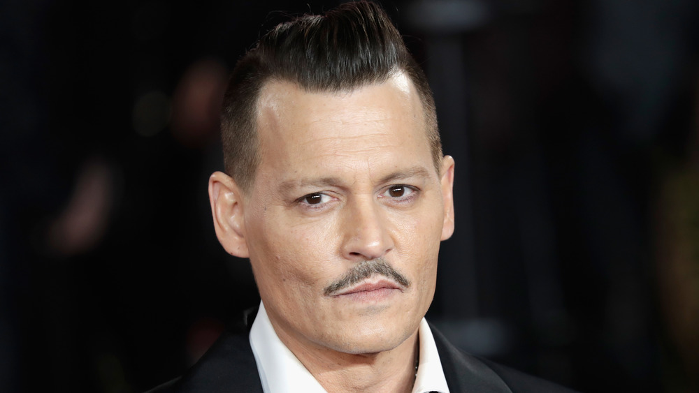 Johnny Depp looking at camera